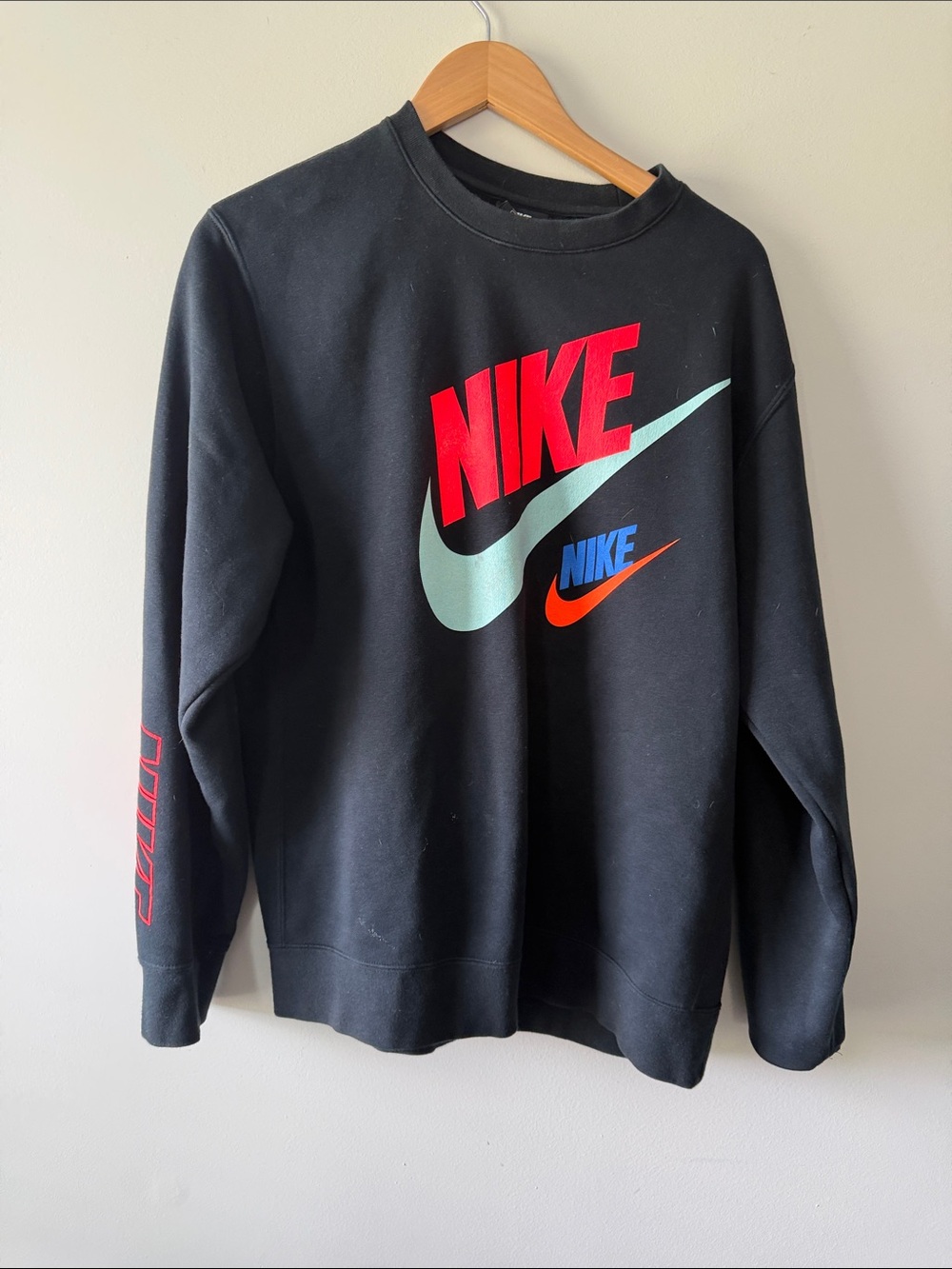 Nike Black Crewneck Sweatshirt with Red, Teal & Blue Logos